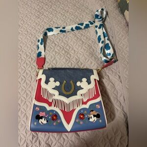 Gently used: Disney Blue and Pink Crossbody Loungefly Crossbody